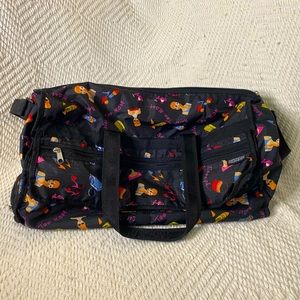 “Never Too Many” American Tourister Duffel Bag